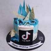 D.1.c TIK TOK - Children Birthday Cakes - WILTON PATISSERIE